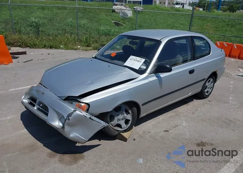 2000 Hyundai Accent L из США, поврежденный, VIN KMHCF35G6YU019915